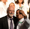 Omar Shehab and the Dean take an on-stage selfie